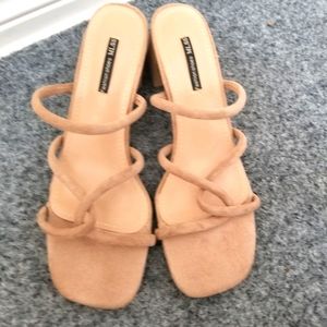 Used beige sandals